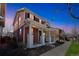 Charming two story home with covered front porch and white columns at 2983 Fulton St, Denver, CO 80238
