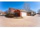 Detached two car garage with alley access and parking pad for additional parking at 2983 Fulton St, Denver, CO 80238