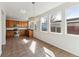 Bright kitchen featuring stainless appliances, and ample windows at 2983 Fulton St, Denver, CO 80238