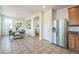 Spacious kitchen and dining area with stainless steel appliances and ample counter space at 2983 Fulton St, Denver, CO 80238
