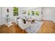 Airy living room featuring a neutral color palette and hardwood flooring at 2983 Fulton St, Denver, CO 80238