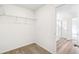 Small walk-in closet with carpet and wire shelving at 13402 E 110Th Way, Commerce City, CO 80022