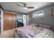 Comfortable bedroom with carpet, fan, closet and natural light at 12101 Riverdale Rd, Brighton, CO 80602