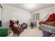 Multi-purpose bedroom offering natural light and storage space at 60 S Moline St, Aurora, CO 80012