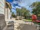 Outdoor patio area with stylish seating, perfect for entertaining or relaxing in a cozy backyard at 12682 Kearney St, Thornton, CO 80602