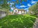 Lush backyard features a well-manicured lawn and a cozy patio area, perfect for enjoying the outdoors at 12682 Kearney St, Thornton, CO 80602