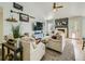 Cozy living room featuring vaulted ceilings, a fireplace, and stylish furnishings, perfect for relaxation and entertaining at 12682 Kearney St, Thornton, CO 80602