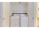 Convenient laundry closet with washer and dryer, perfect for easy chore completion at 19440 E Mann Creek Dr # E, Parker, CO 80134