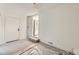 Unfinished basement with a door to the kitchen at 1840 S Shoshone St, Denver, CO 80223