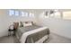 Bright bedroom with a comfortable bed and large windows at 1840 S Shoshone St, Denver, CO 80223