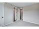 Neutral bedroom with access to multiple rooms offers carpeting and lots of natural light at 1418 Hudson Pl, Longmont, CO 80501