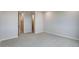 Spacious carpeted bedroom with natural light at 1418 Hudson Pl, Longmont, CO 80501