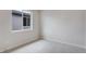 Comfortable bedroom offers lots of natural light and neutral decor at 1418 Hudson Pl, Longmont, CO 80501