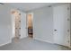 Large bedroom with ensuite bathroom and closet offers fresh paint and carpeting at 1418 Hudson Pl, Longmont, CO 80501