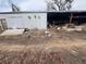 Exterior of a metal outbuilding with clutter at 14624 County Road 12, Fort Lupton, CO 80621