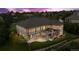 Beautiful home with a patio, deck, and lush landscaping; a great space for outdoor entertaining and relaxation at 6303 Ellingwood Point Pl, Castle Rock, CO 80108