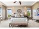 Spacious main bedroom with a ceiling fan, and scenic views from the windows at 6303 Ellingwood Point Pl, Castle Rock, CO 80108