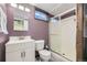 Basement bathroom with a walk-in shower and modern vanity at 6995 S Ash Cir, Centennial, CO 80122