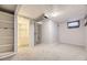 Unfinished basement with laundry and storage at 6995 S Ash Cir, Centennial, CO 80122