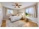 Spacious bedroom with hardwood floors and ceiling fan at 6995 S Ash Cir, Centennial, CO 80122