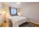 Cozy bedroom with hardwood floors and window at 6995 S Ash Cir, Centennial, CO 80122