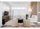 Inviting living room features stylish decor, comfortable seating, accent wall, and ample natural light, for a relaxed ambiance at 2920 W Parkside Pl, Denver, CO 80221