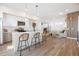 Open-concept layout connecting the kitchen, dining, and living areas, with lots of natural light at 2920 W Parkside Pl, Denver, CO 80221