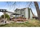 Backyard with deck, outdoor furniture, and well-maintained lawn at 11207 Day Star Ct, Parker, CO 80138