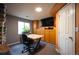 Finished basement with a large TV and storage at 11207 Day Star Ct, Parker, CO 80138