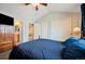 Bedroom featuring a vaulted ceiling, carpeted floor, and closet at 11207 Day Star Ct, Parker, CO 80138
