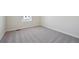 Bright bedroom featuring neutral carpet, base trim and a window at 19019 E 94Th Pl, Commerce City, CO 80022