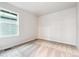 Light-filled bedroom with neutral carpet and a view from the window at 19019 E 94Th Pl, Commerce City, CO 80022