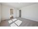 Neutral bedroom featuring carpeted floors, recessed lighting, and ensuite bath access at 19019 E 94Th Pl, Commerce City, CO 80022