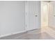 Neutral carpeted bedroom with a door leading to another room at 19019 E 94Th Pl, Commerce City, CO 80022