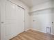 Laundry room featuring wood-look flooring, a closet and utility hookups at 19019 E 94Th Pl, Commerce City, CO 80022