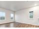 Bright living room with natural light, creating a cozy and inviting space for relaxation at 19019 E 94Th Pl, Commerce City, CO 80022