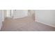 Neutral loft featuring neutral carpet, base trim, white doors and natural lighting at 19019 E 94Th Pl, Commerce City, CO 80022