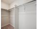 Walk-in closet with carpet and white shelving at 19019 E 94Th Pl, Commerce City, CO 80022
