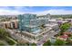 Panoramic aerial shot showcasing a modern building with city and mountain views at 4200 W 17Th Ave # 327, Denver, CO 80204