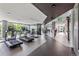 Modern gym with treadmills, weights, and open space for exercising and maintaining a healthy lifestyle at 4200 W 17Th Ave # 327, Denver, CO 80204