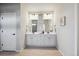 Dual sink bathroom with lots of storage and modern fixtures at 5142 N Quemoy Ct, Aurora, CO 80019