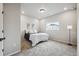 Bedroom with gray walls, carpet, and a large window for natural light at 5142 N Quemoy Ct, Aurora, CO 80019