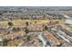 Aerial view of townhome community and surrounding landscape and pool at 3046 W Prentice Ave # E, Littleton, CO 80123