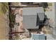 Aerial view of the home's backyard showcasing patio area, garden, yard and landscaping at 15028 Clayton St, Thornton, CO 80602