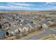 Birds eye view of the neighborhood with mountain views in the distance at 15028 Clayton St, Thornton, CO 80602