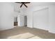 Spacious primary bedroom featuring neutral carpet and an ensuite bathroom at 15028 Clayton St, Thornton, CO 80602