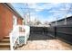 Fenced backyard featuring flagstone and a dark mulch area at 120 Cherokee St, Denver, CO 80223