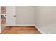 Bedroom showcasing hardwood floors and white trim at 120 Cherokee St, Denver, CO 80223