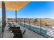 Balcony with outdoor seating that offers panoramic neighborhood views at 3994 Breakcamp Ct, Castle Rock, CO 80108