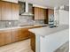 Modern kitchen featuring stainless steel appliances, sleek countertops, and stylish cabinetry at 3994 Breakcamp Ct, Castle Rock, CO 80108